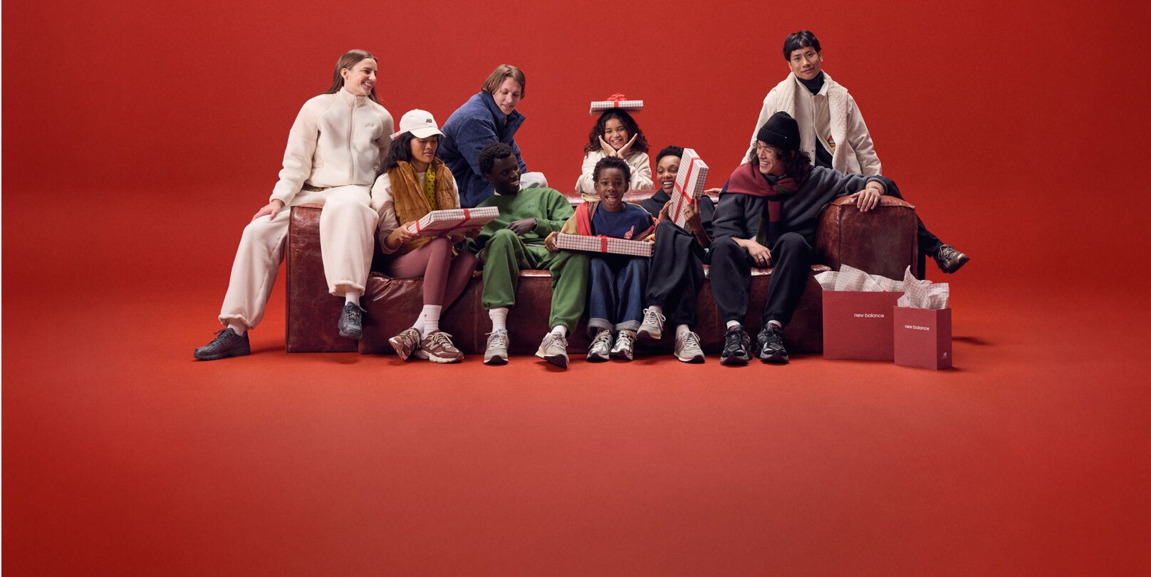 A group of people sitting on a couch.