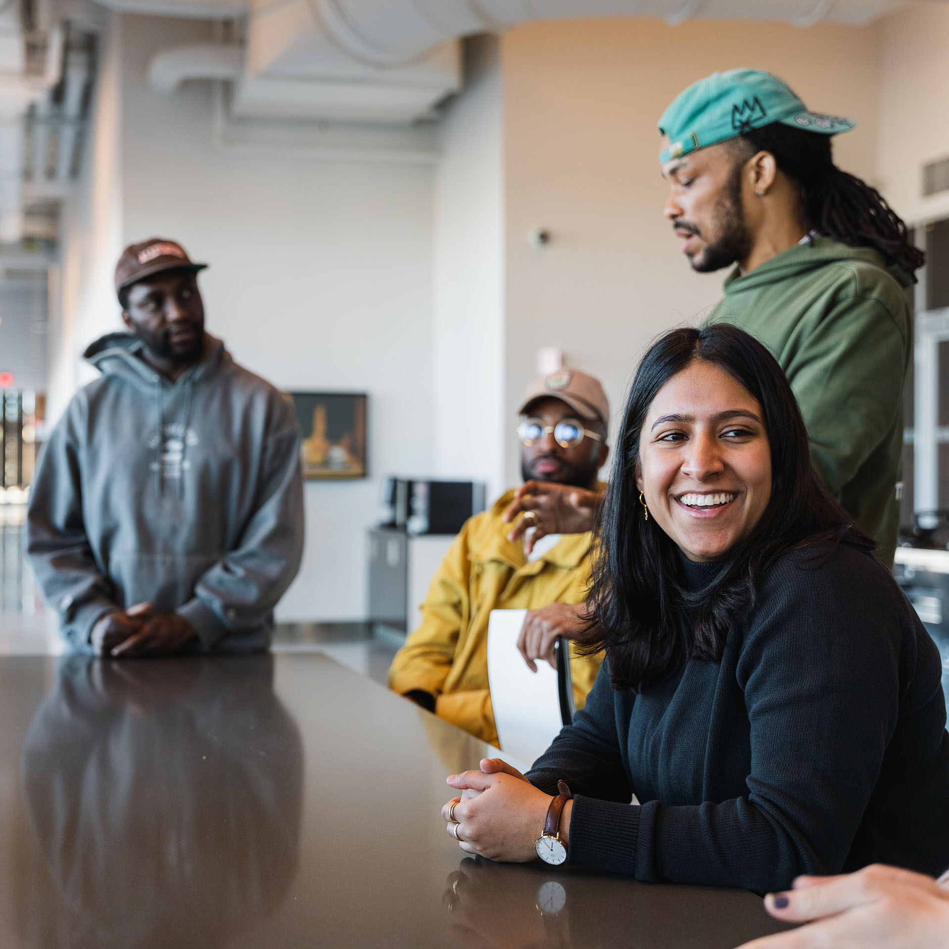 Group of people sitting around a table