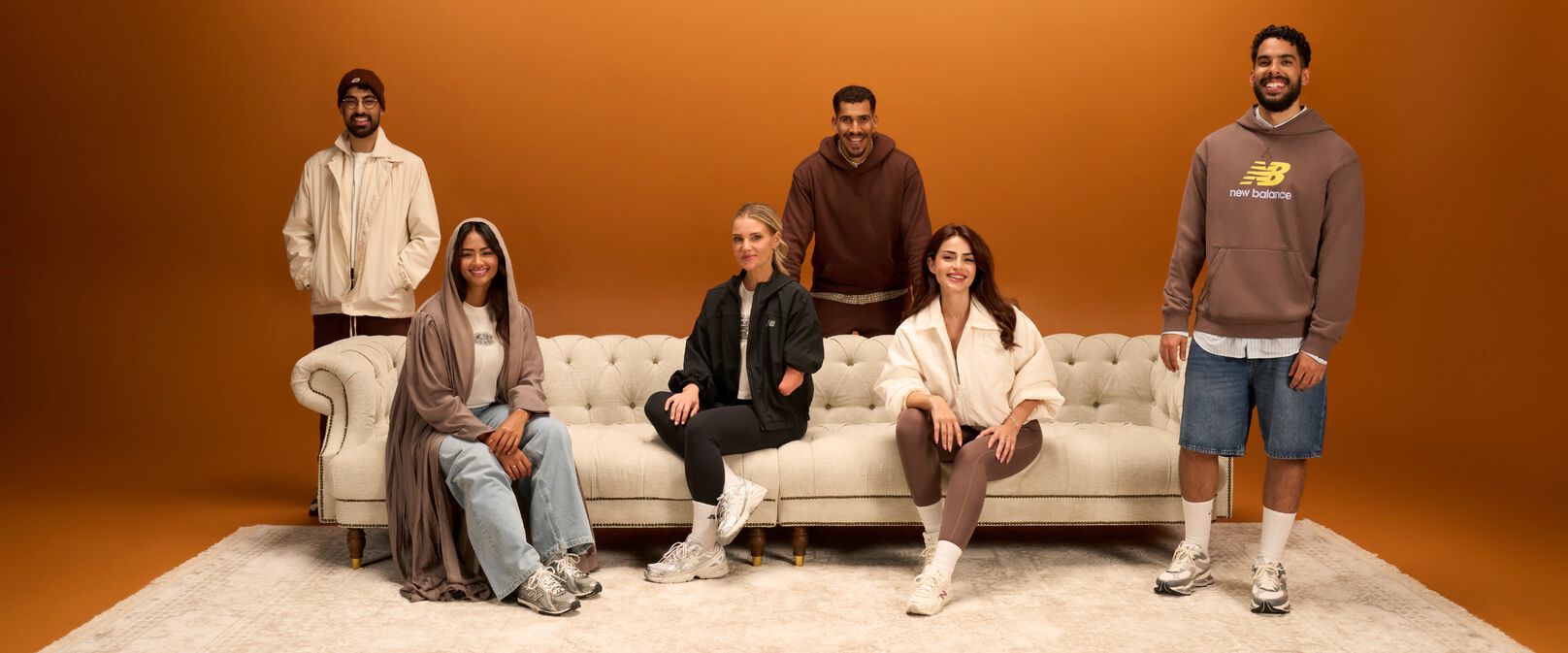 Young attractive people sitting on a couch